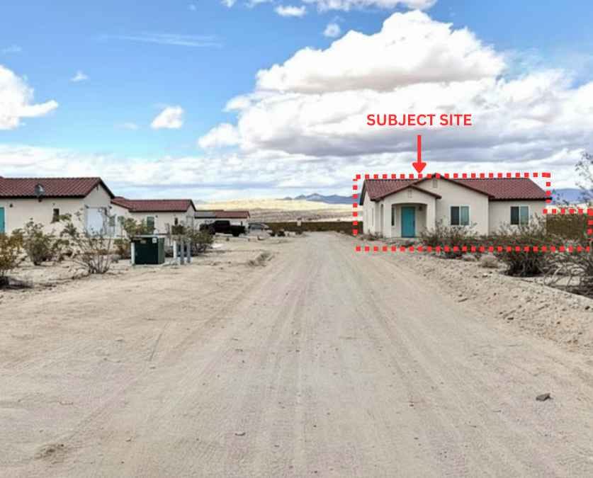 The same view at 6986 Park Ave with a home illustrated on the lot, the parcel outlined in red
