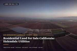 Residential land for sale California — vacant desert lot in Helendale with power poles along the road