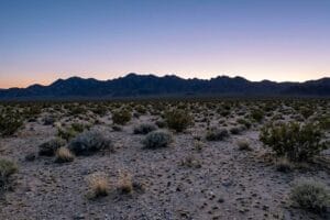 Soledad CA land for sale — an open, undeveloped California parcel with dry ground, no buildings, and low hills along the horizon