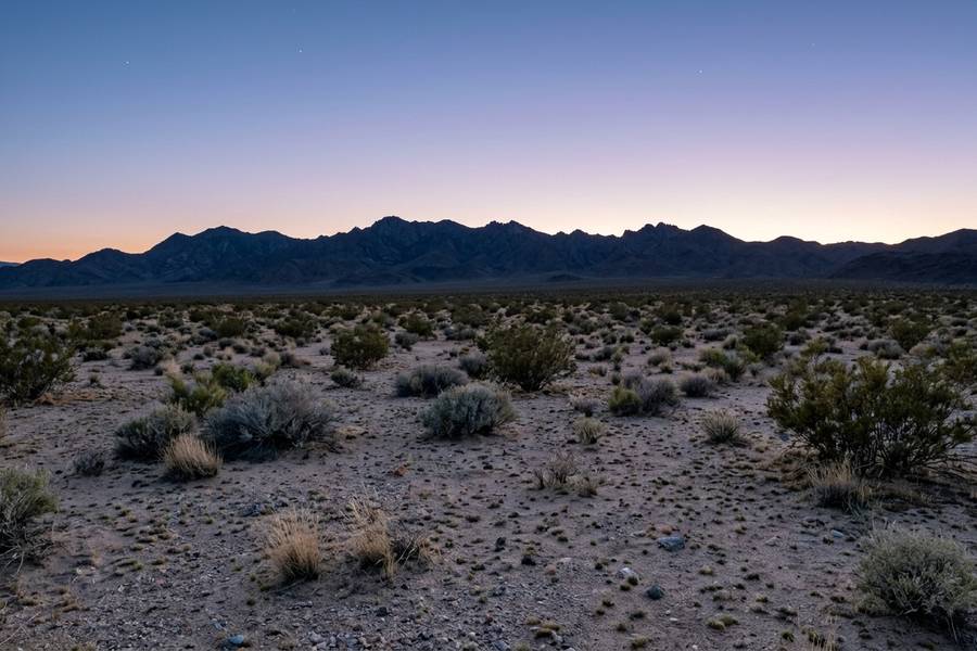 Soledad CA land for sale — an open, undeveloped California parcel with dry ground, no buildings, and low hills along the horizon